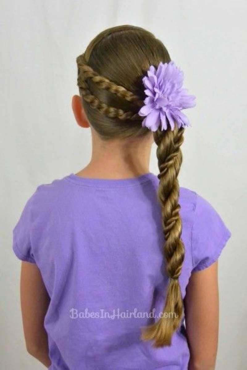 girl-on-purple-with-twisted-ponytail-hairstyle