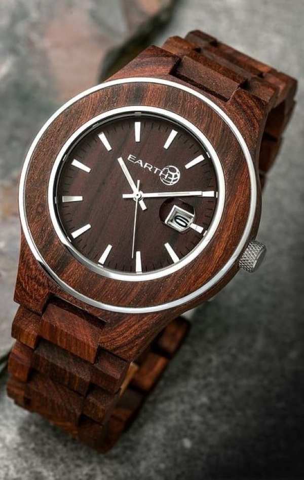 a-wooden-watch-on-blurry-background