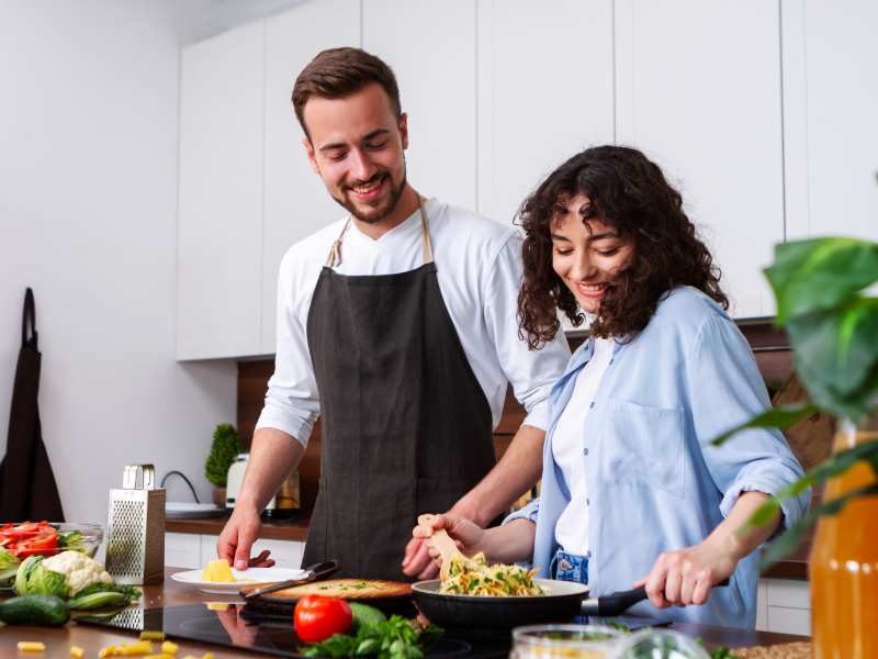 man-and-woman-cooking