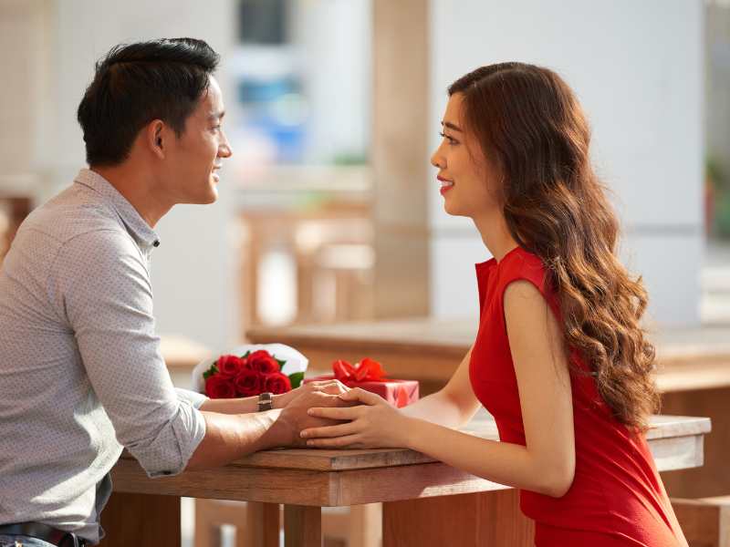 young-man-and-woman-on-a-table-for-valentine's-day