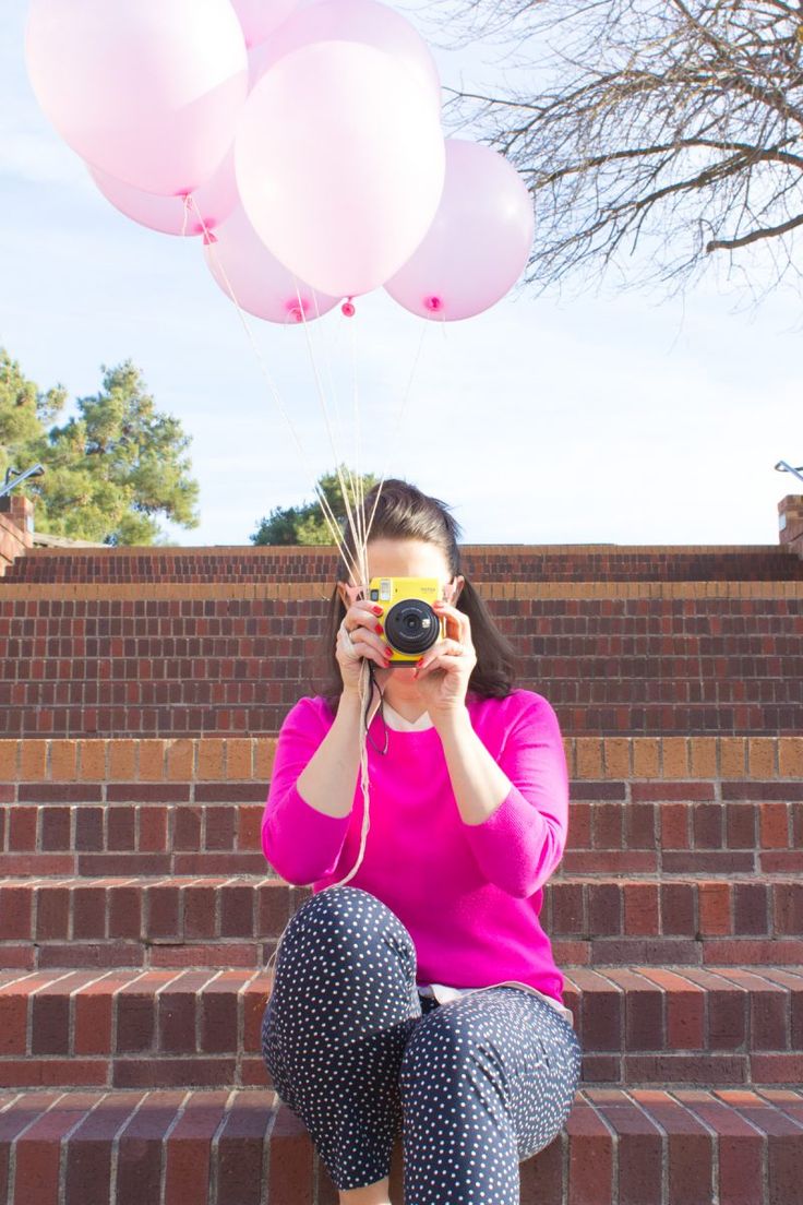 lady-on-pink-with-camera