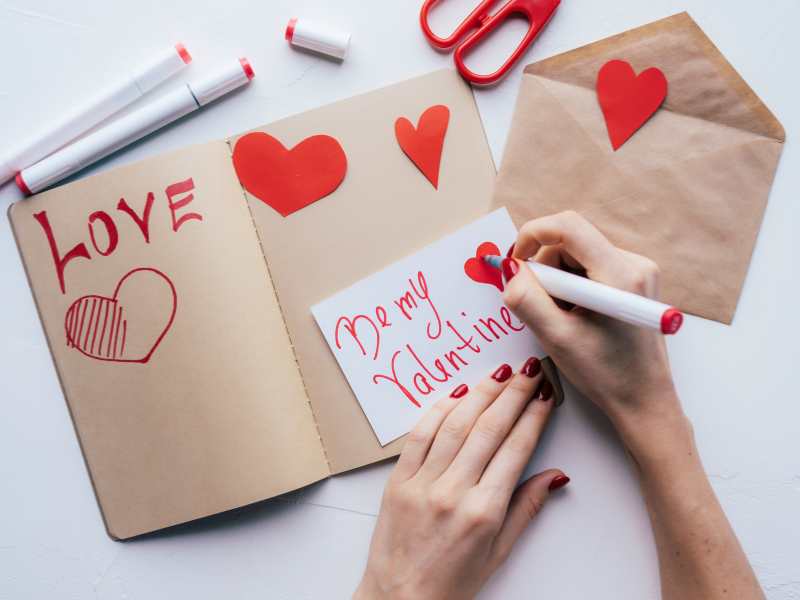 hand-writing-a-poem-for-valentine's-day