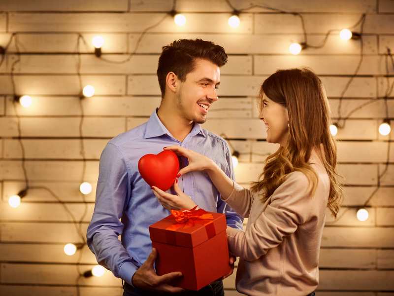 man-and-woman-with-a-red-box-and-a-heart-shape