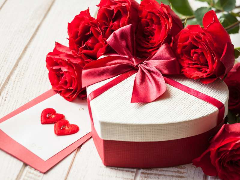 red-roses-white-and-red-cake-on-a-white-table