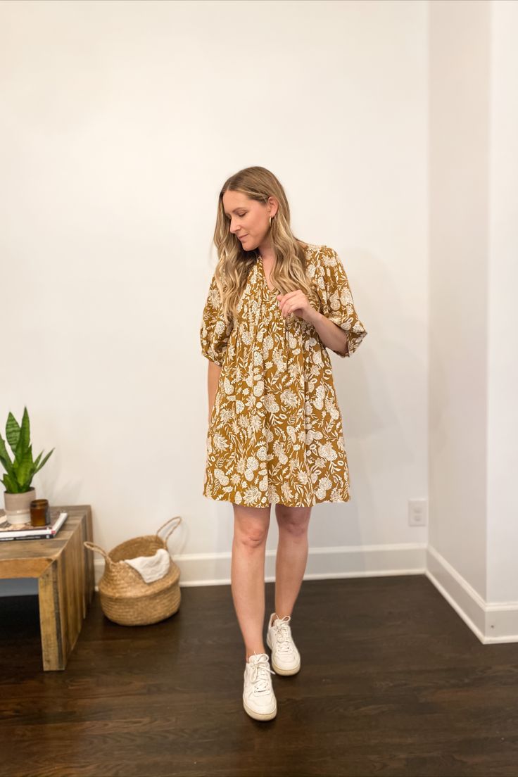 lady-on-floral-midi-dress-with-sneakers