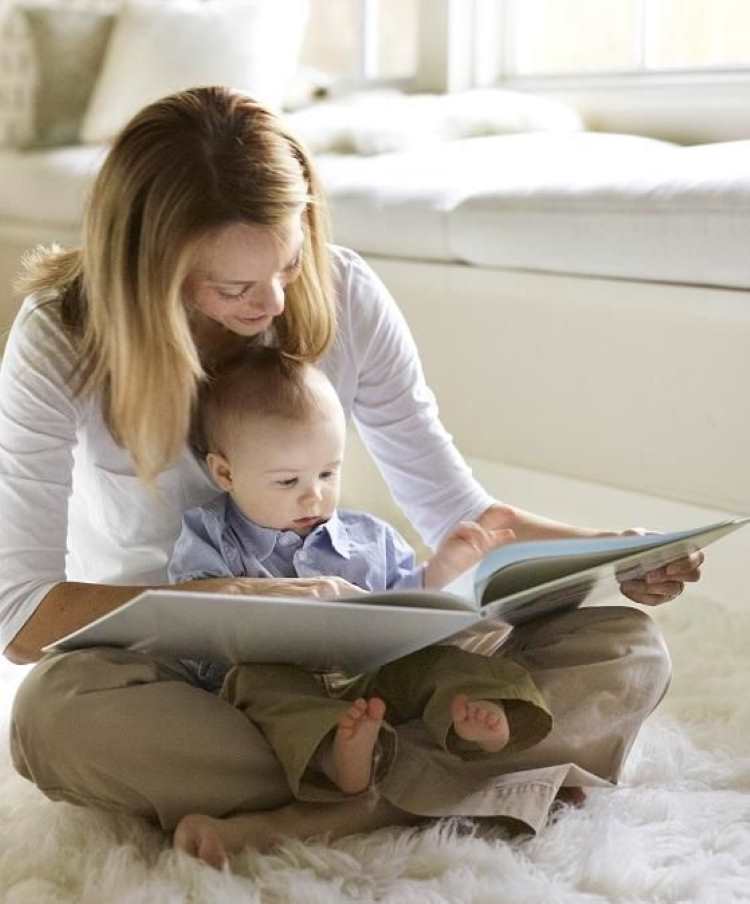 woman-reading-with-a-a-baby