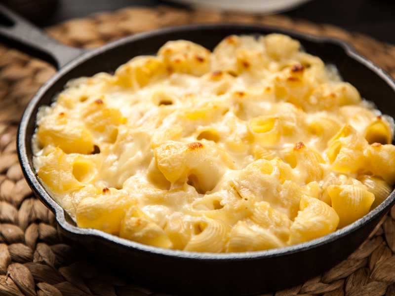 baked-cheese-in-a-black-non-stick-frayin-pan-on-the-table