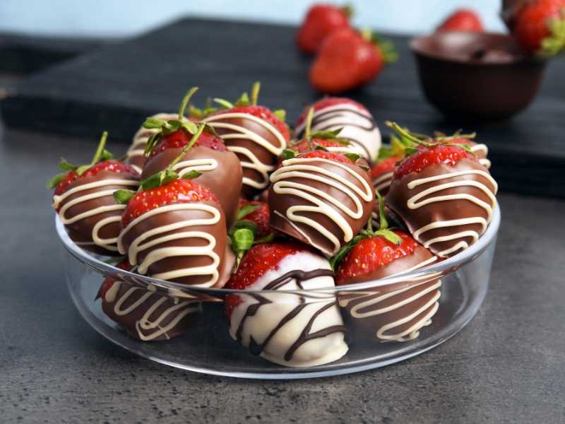 chocolate-covered-with-strawberries-in-a-transparent-bawl