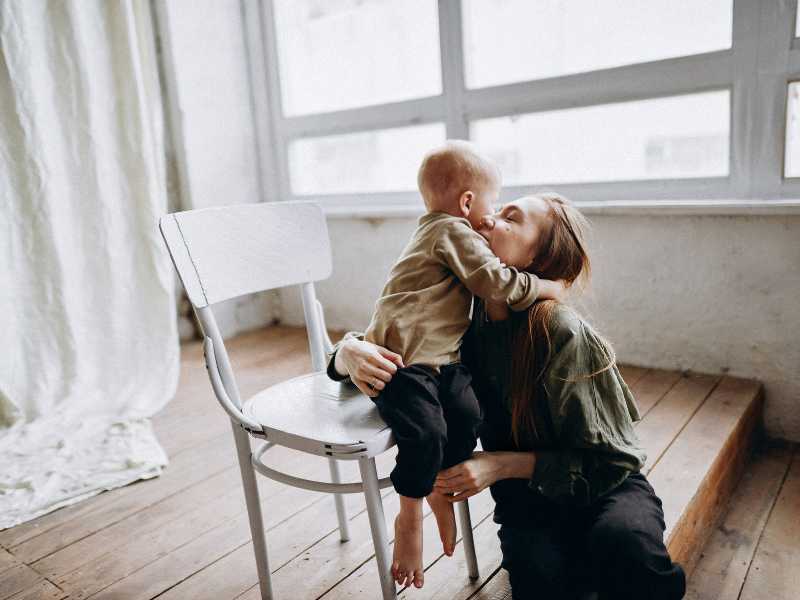 mother hugging-her-son-on-mothers-day-reflection