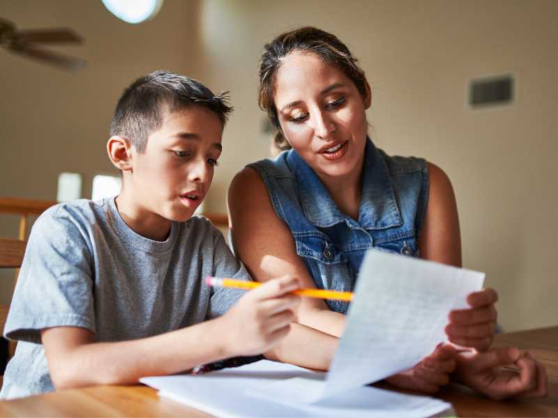 mother-reading-a-letter-of-gratitude-from-son-for mothers-day-reflection