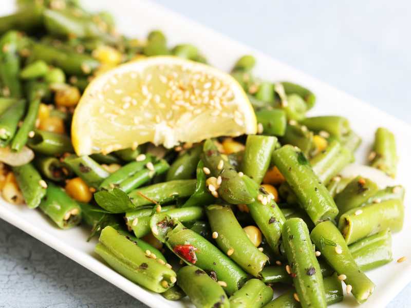 green-beans-with-lemon-dill-in-a-plate-on-the-table-for-mother's-day-dinner