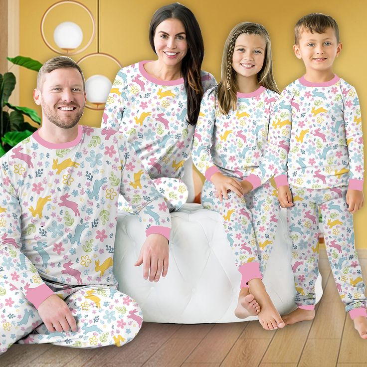 family-of-four-wearing-a-pastel-matching-pajamas