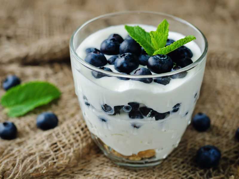 a-glass-of-parfait-with-blue-berry-and-mint