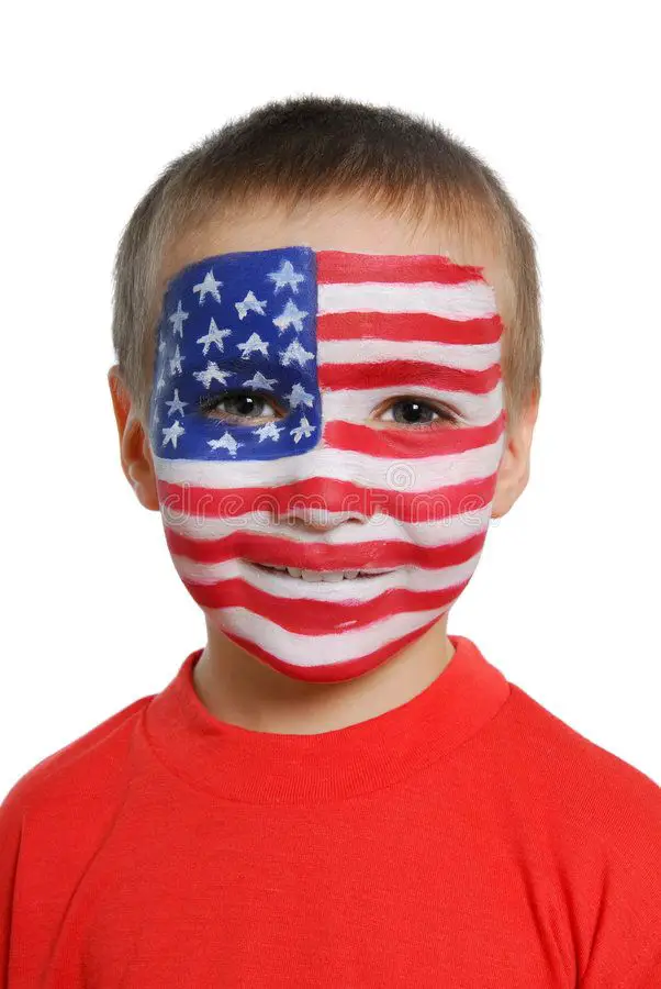 boy-on-red-shirt-with-painted-UsA-flag-on-face
