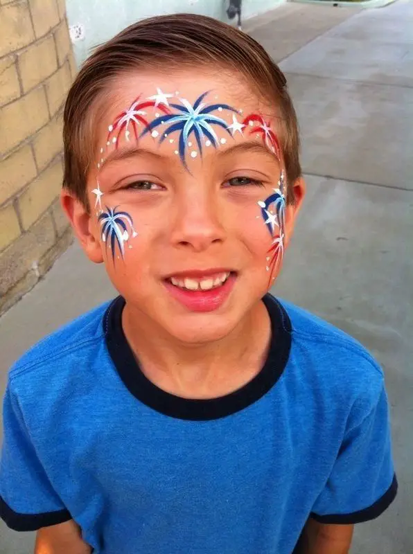 a-boy-with-firecracker-design-on-his-face