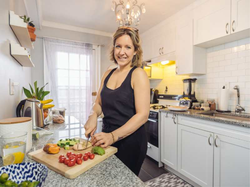 woman-on-black-preparing-meal-a-time-management-tips-for-mothers