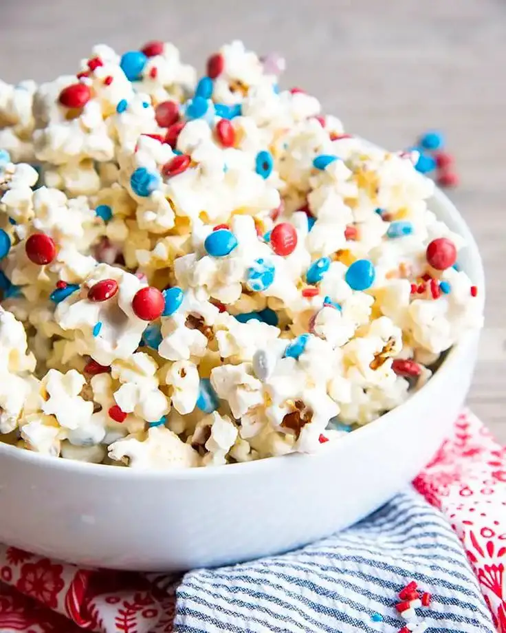 a-bowl-of-popcorn-with-red-and-blue-chocolate-4th-of-july-treat