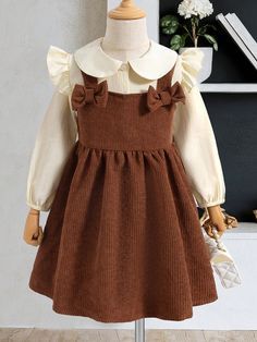 brown-pinafore-gown-and-cream-shirt-perfect-easter-outfit-for-family-photo