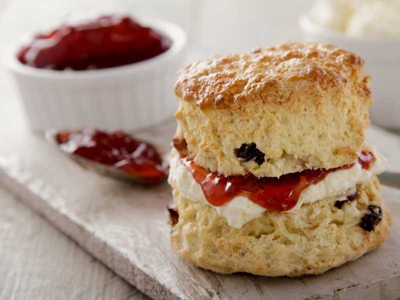 scone-with-clotted-cream-and-jam-on-the-board-summer-tea-party