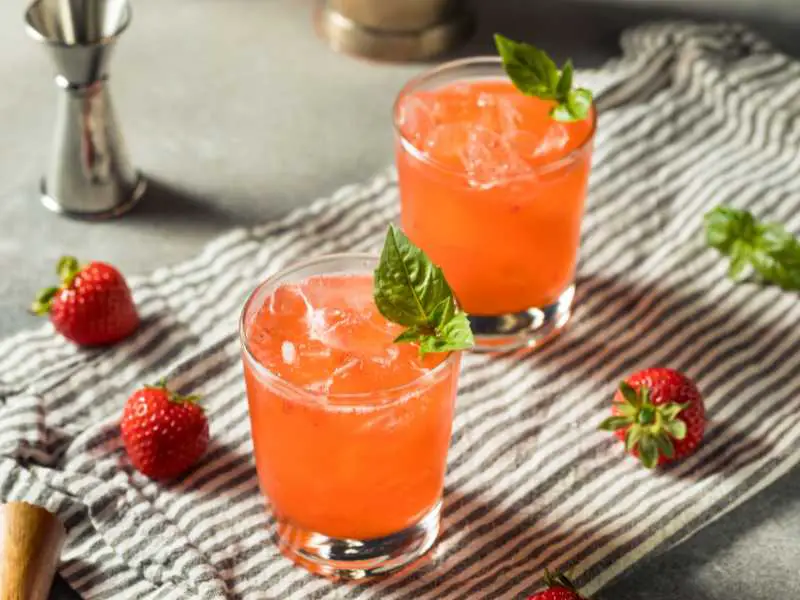two-glass-of-strawberry-basil-with-mint-leaf
