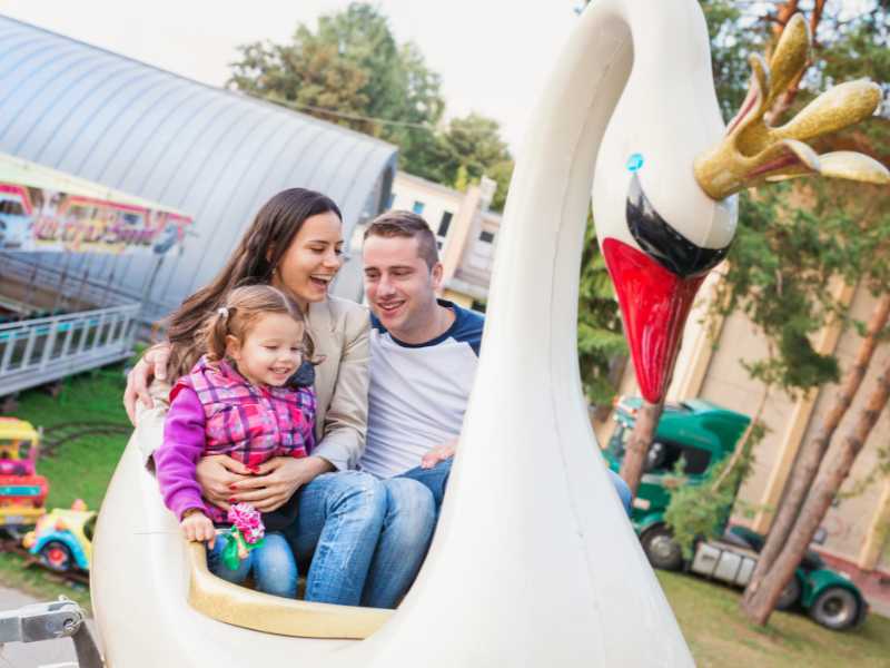 father-mother-and-child-on-a-vacation-at-the-park