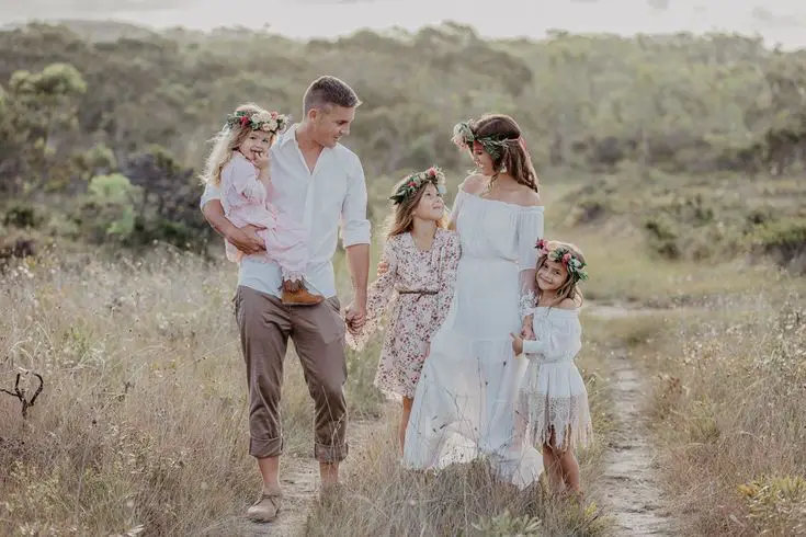 father-and-mother-with-three-kids