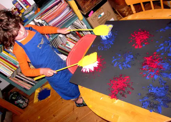 kid-doing-a-firework-july-picnic-ideas-for-family