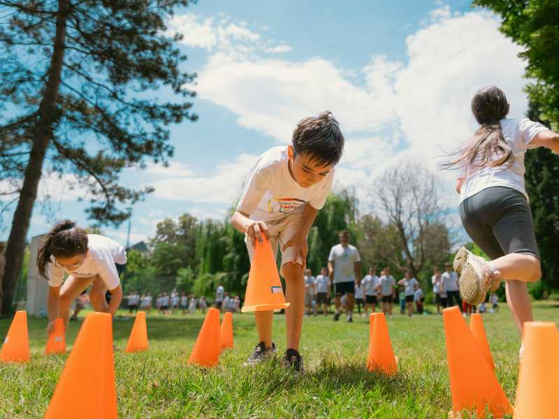 three-kids-doing-an-obstacle-course