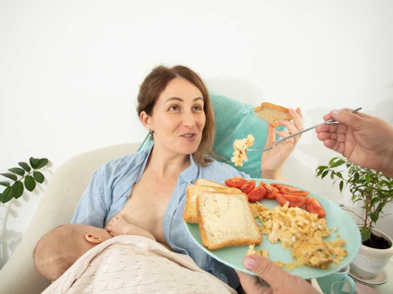 new-mom-being-feed-by-dad-new-mom-survival-tip