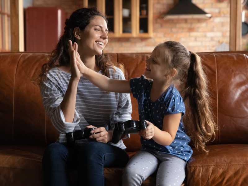 mom-celebrating-with-her-daughter