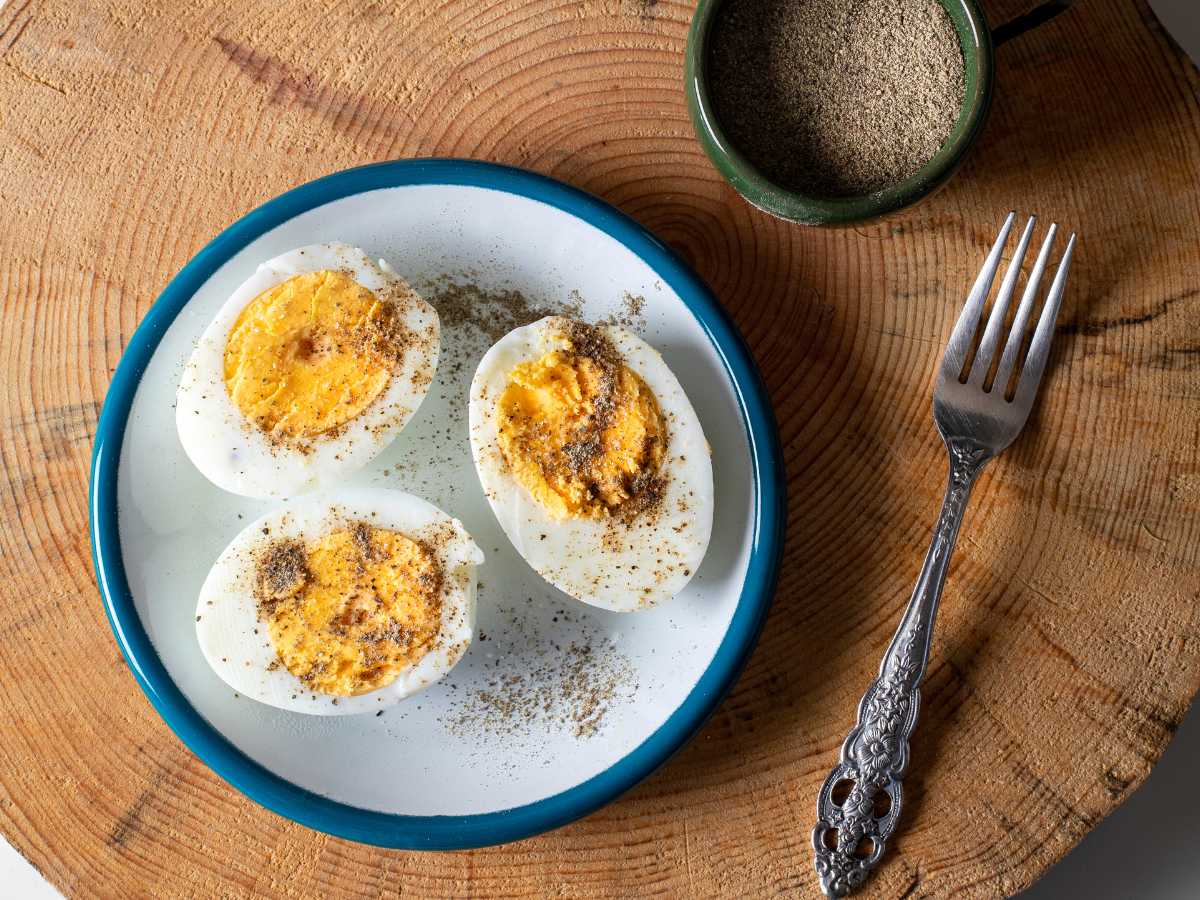 three-hard-boil-egg-in-a-serving-dish-with-spice