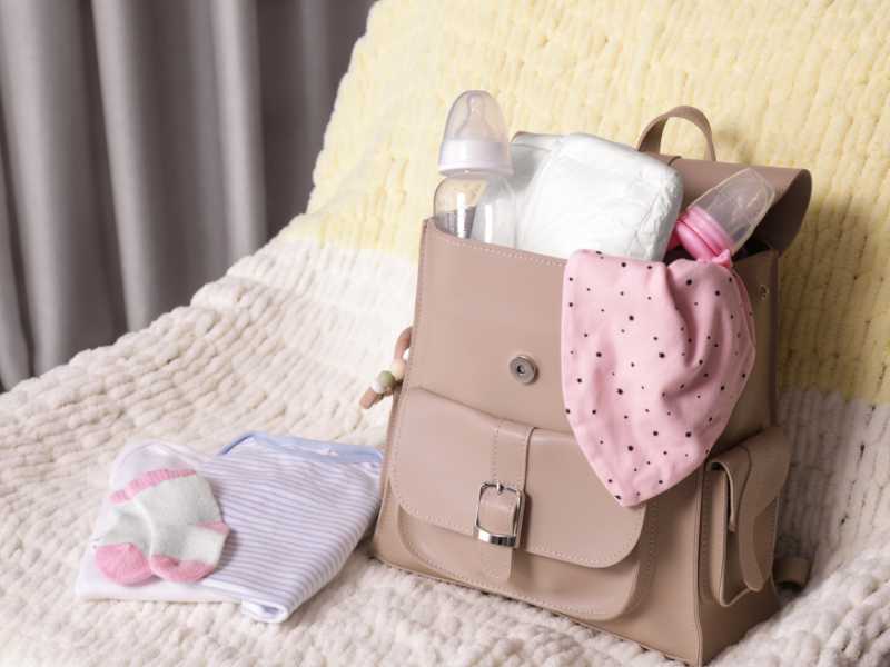 diaper-caddy-on-the-chair-new-mom-survival-tip