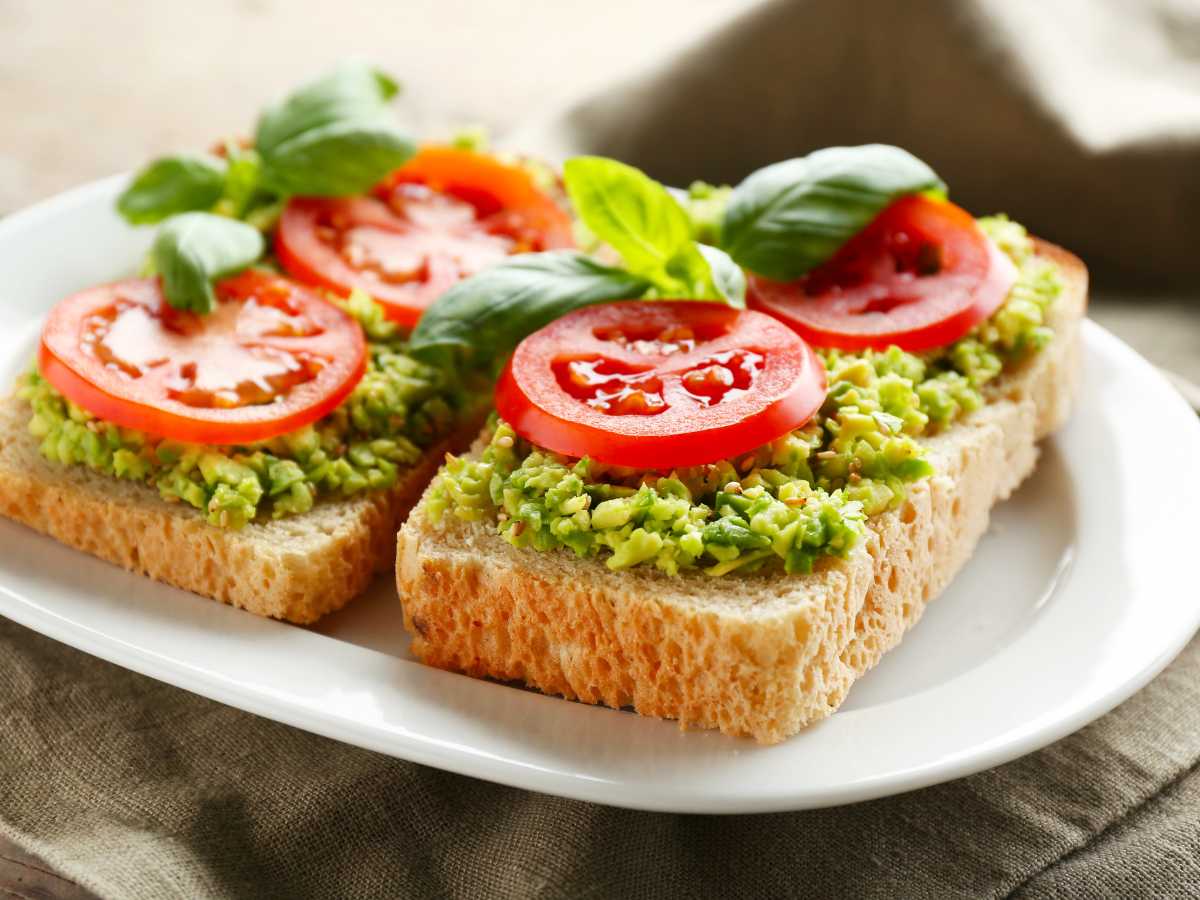 two-slice-of-bread-with-mashed-and-tomato