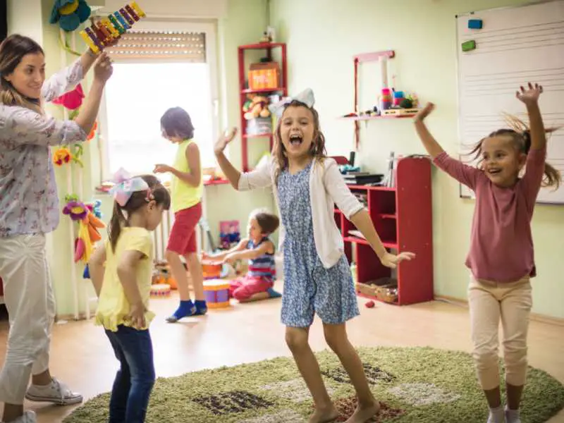 mom-playing-music-for-kids-calm-toddler-tantrum-hacks