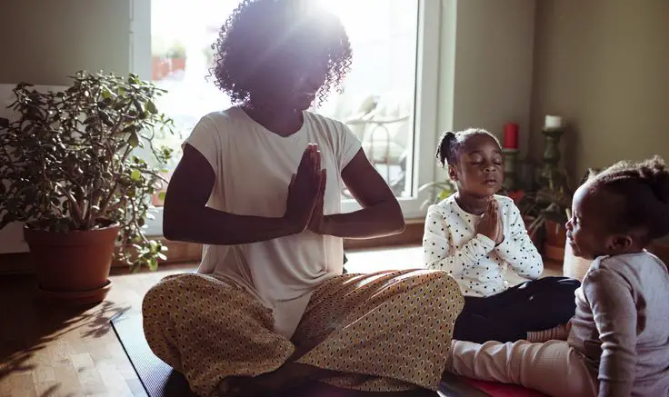 mom-taking-deep-breath-with-her-children-calm-toddler-tantrum-hack