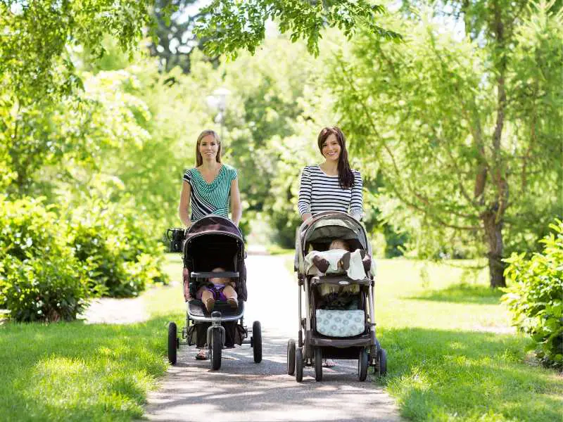 mom-taking-evening-walk-with-babies