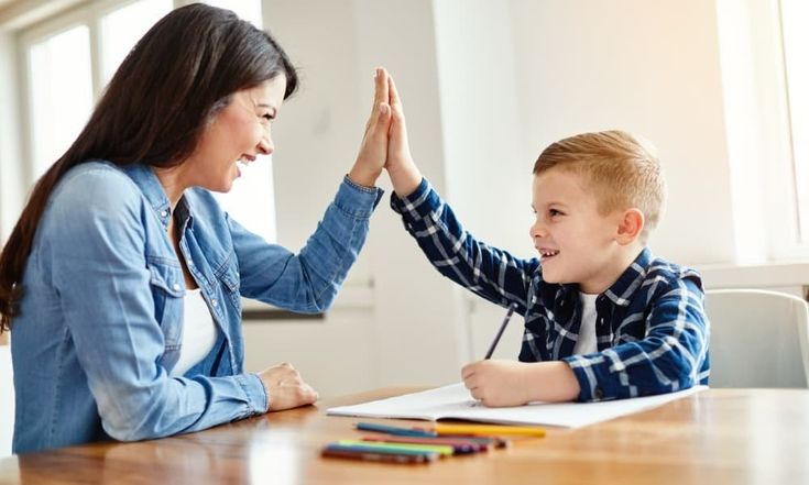 mom-giving-baby-high-five-calm-toddler-tantrum-hacks