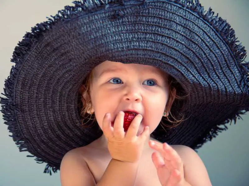 baby-on-black-brim-hat