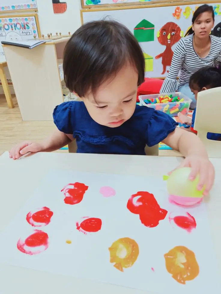 toddler-with-balloon-art-toddler-crafts-to-do-at-home