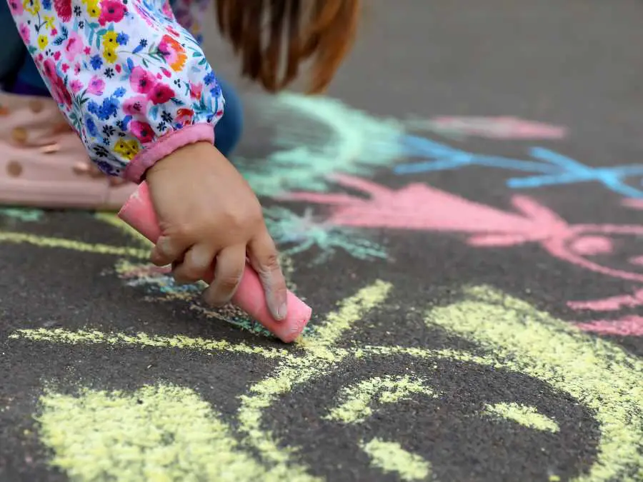 toddler-drawing-with-chalk-