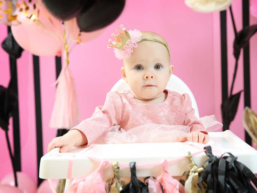 baby-taking-photo-on-baby-halloween-high-chair