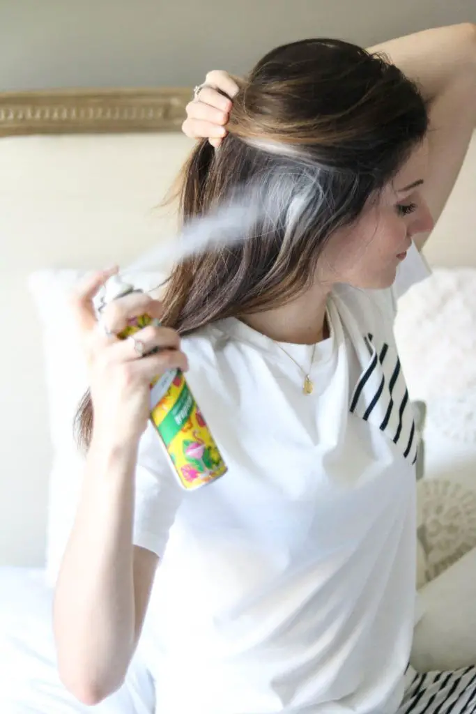 lady-using-dry-shampoo