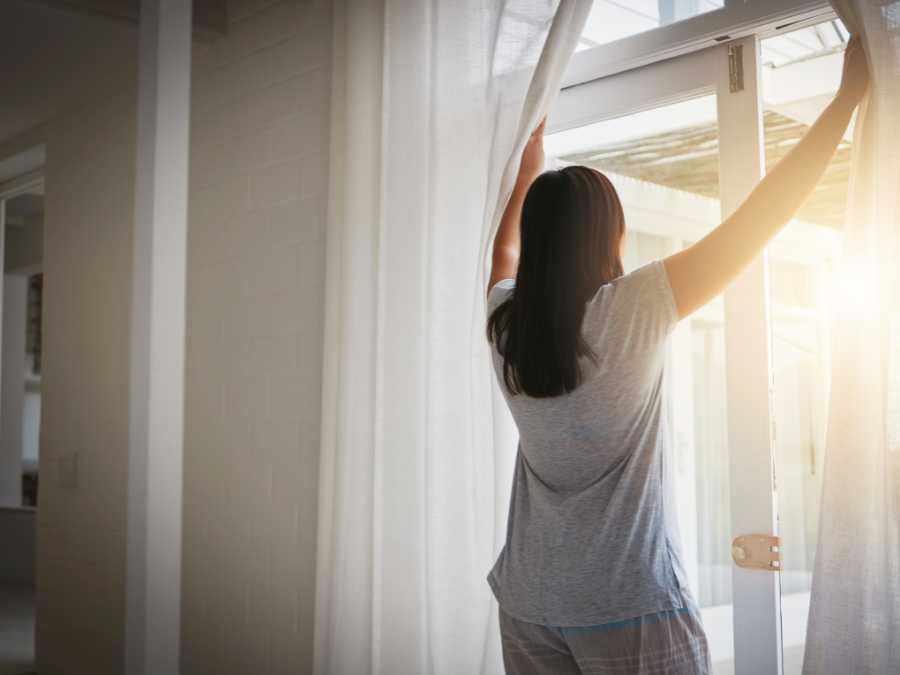 lady-opening-cutting-for-natural-light
