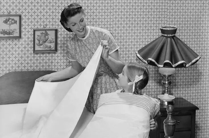 making-the-bed-first-thing-in-the-morning