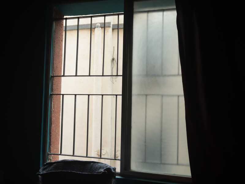 opening-window-at-night-ways-on-how-to-make-your-bedroom-cooler-without-ac