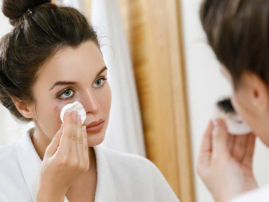 lady-removing-makeup-gently-laze-girls-summer-hair-and-beauty