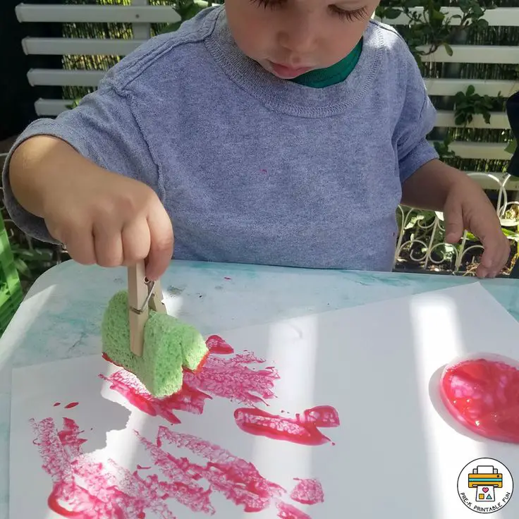child-painting-with-sponge-toddler-crafts-to-do-at-home