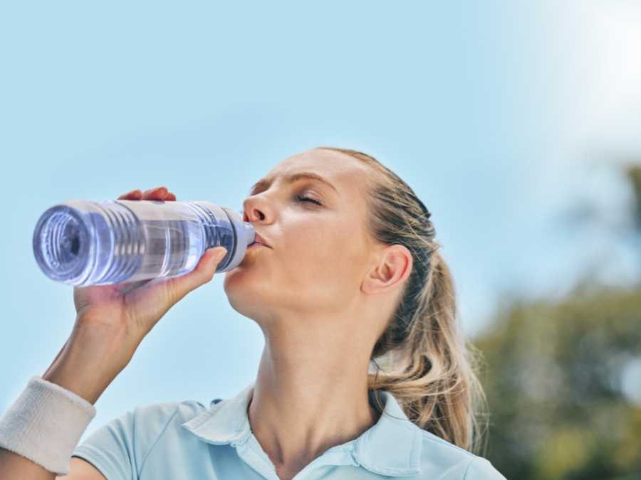 lady-drinking-water-to-stay-hydrated