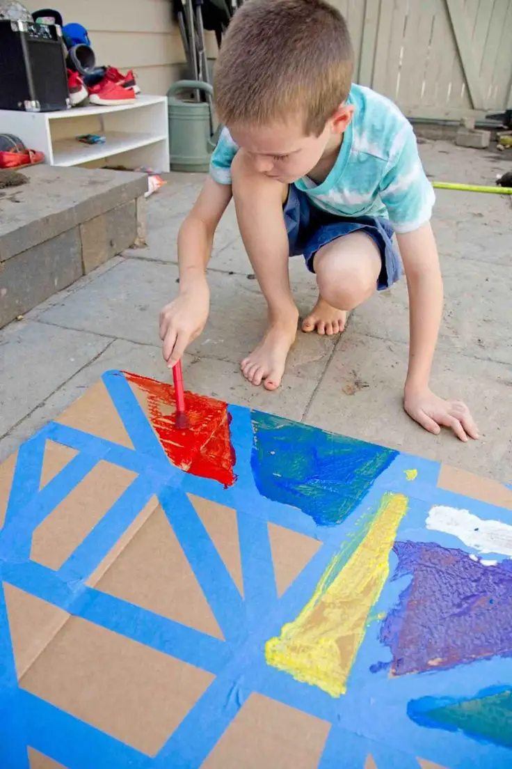 toddler-painting-with-tape-resist-art