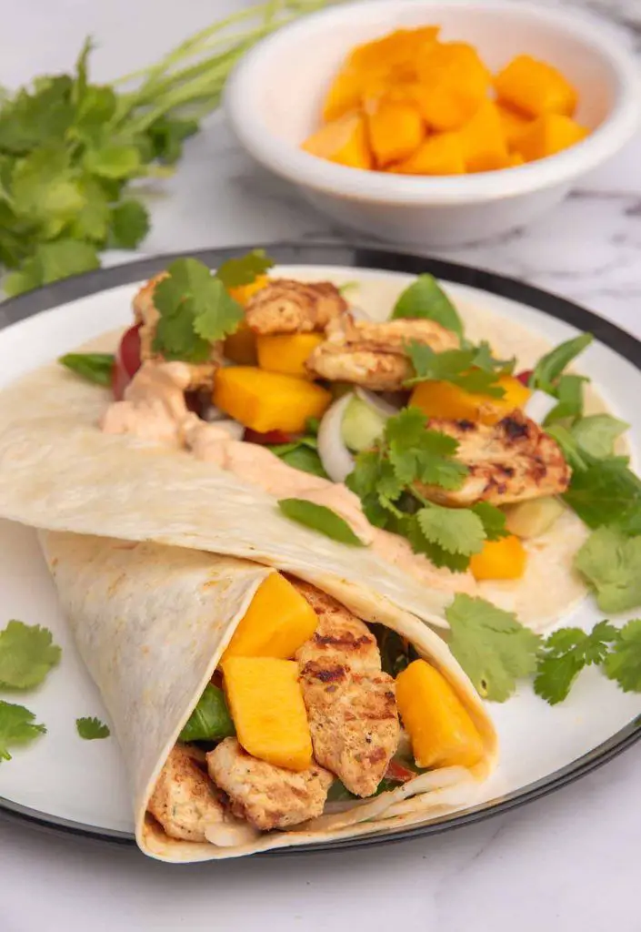 a-plate-of-mango-chicken-wrap